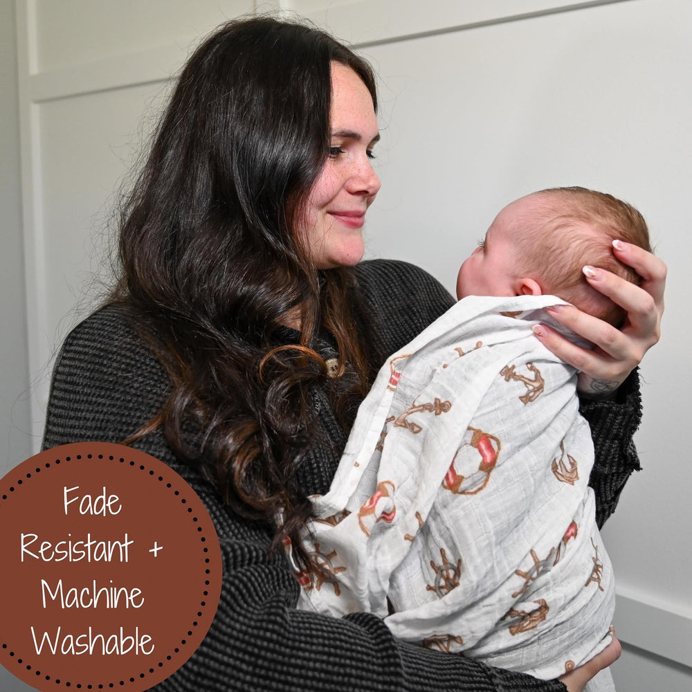 LollyBanks swaddle used as burp cloth or nursing cover in daily routine
