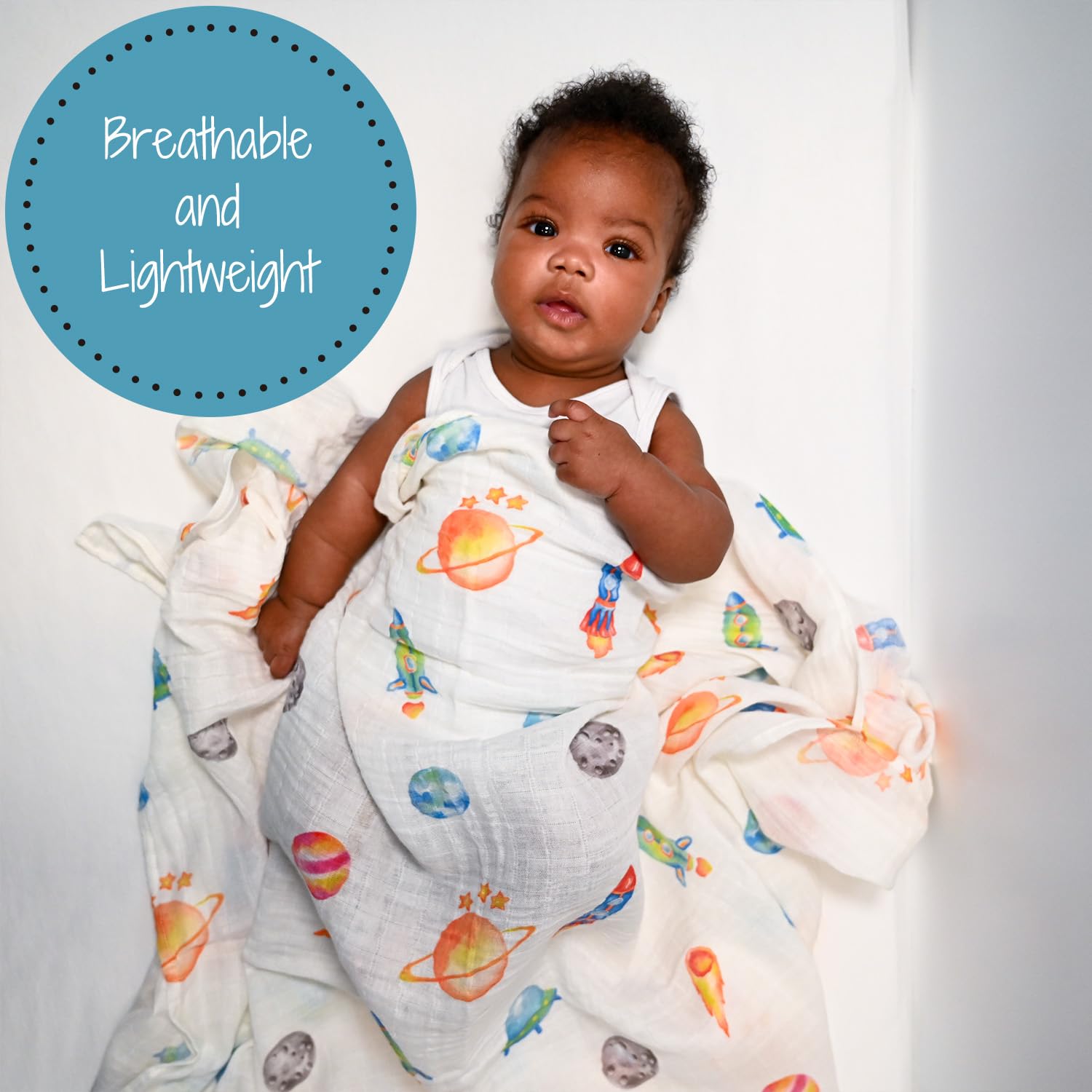LollyBanks universe design swaddle keeps baby cozy during burps and cuddles.