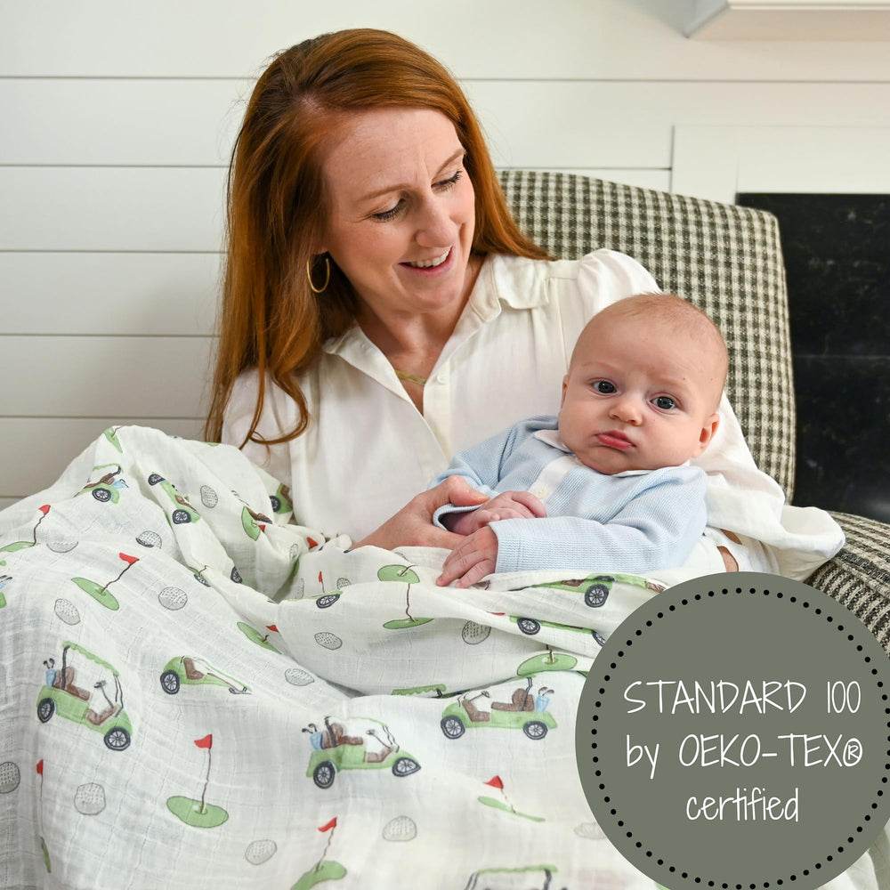LollyBanks versatile swaddle supports burps, nursing and crib decor.