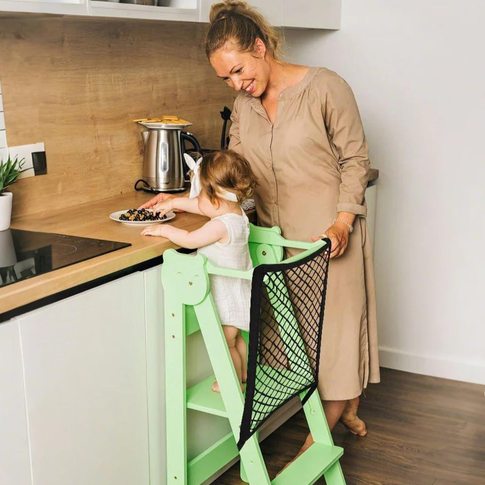 Lontcs toddler safety net creates a playful kitchen zone for safe pretend cooking.