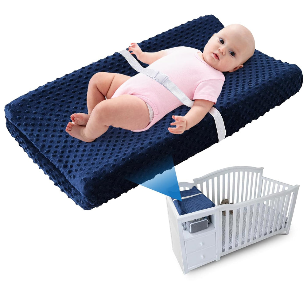 LOONAH compact changing pad with contoured sides for secure baby changes.