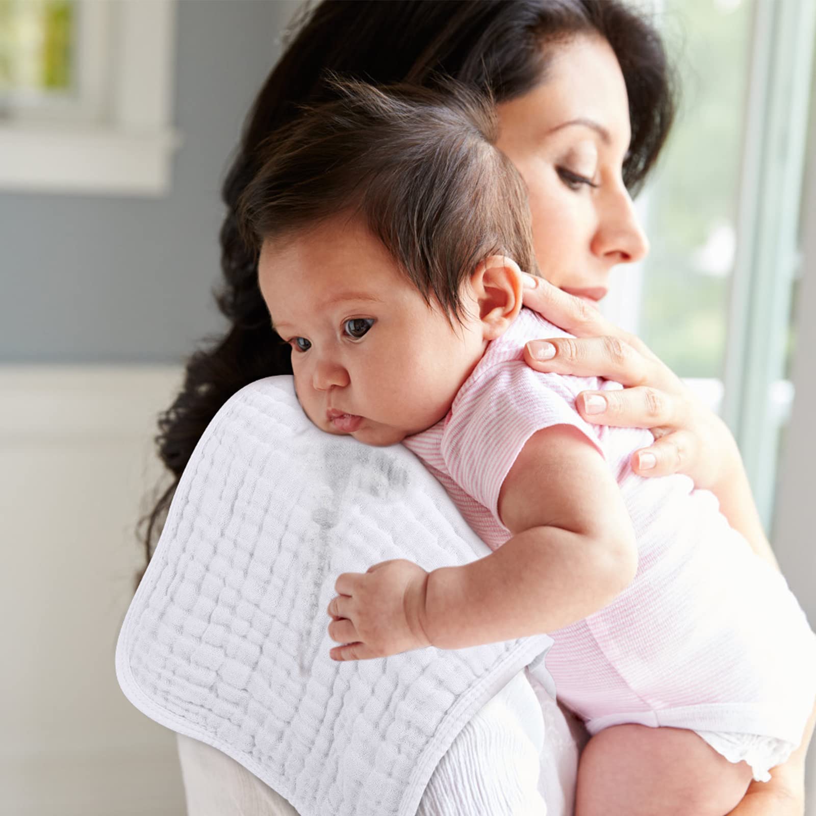 Looxii burp cloths offer multi-use versatility as wipes or changing pad cover.