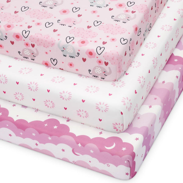 Looxii pack n play fitted sheet in pink cloud pattern for cozy baby sleep.