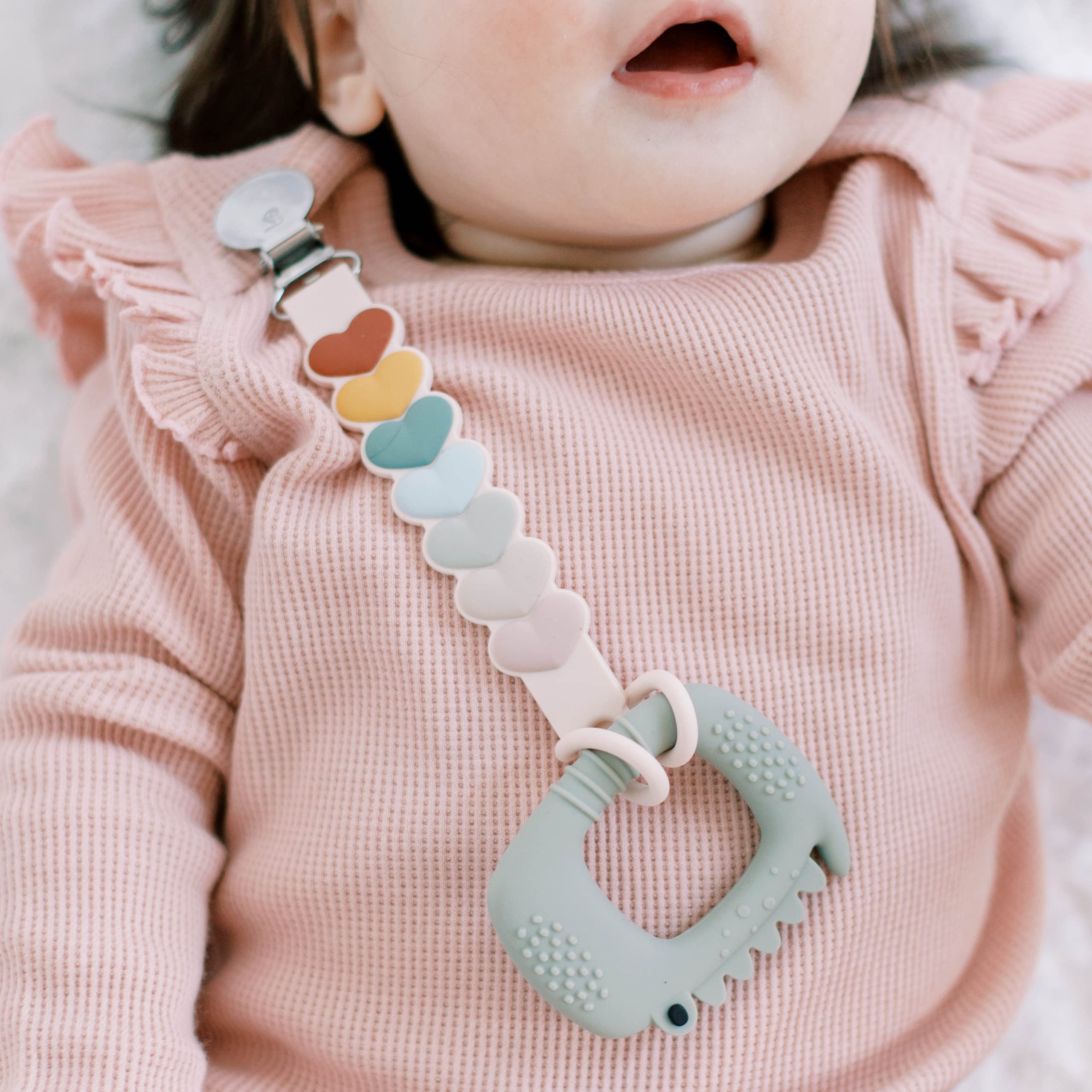 Loulou Lollipop beadless silicone pacifier clip on baby clothing for easy access