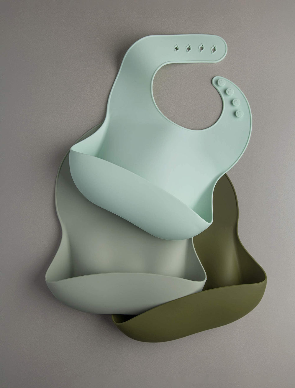 Loulou Lollipop Silver Sage bib adds a modern touch