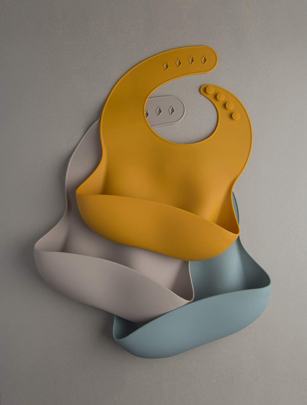 Loulou Lollipop slate bib modern color coordinating with outfits