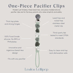 Loulou Lollipop pacifier clip on clothing Daisy Blue for quick access and mess prevention.