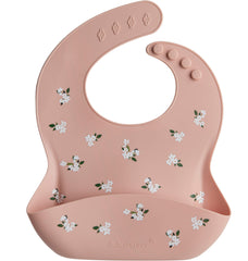 Loulou Lollipop soft silicone bib close-up showing flexible material for comfy meals