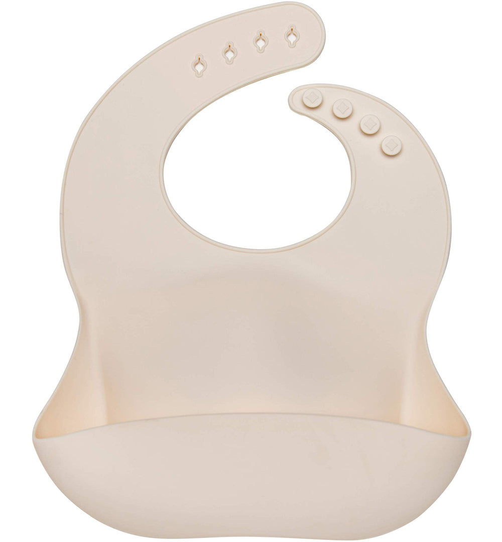 Loulou Lollipop waterproof bib front view with large pocket catching crumbs.