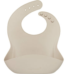 Loulou Lollipop waterproof bib in sand, soft texture and easy clean.