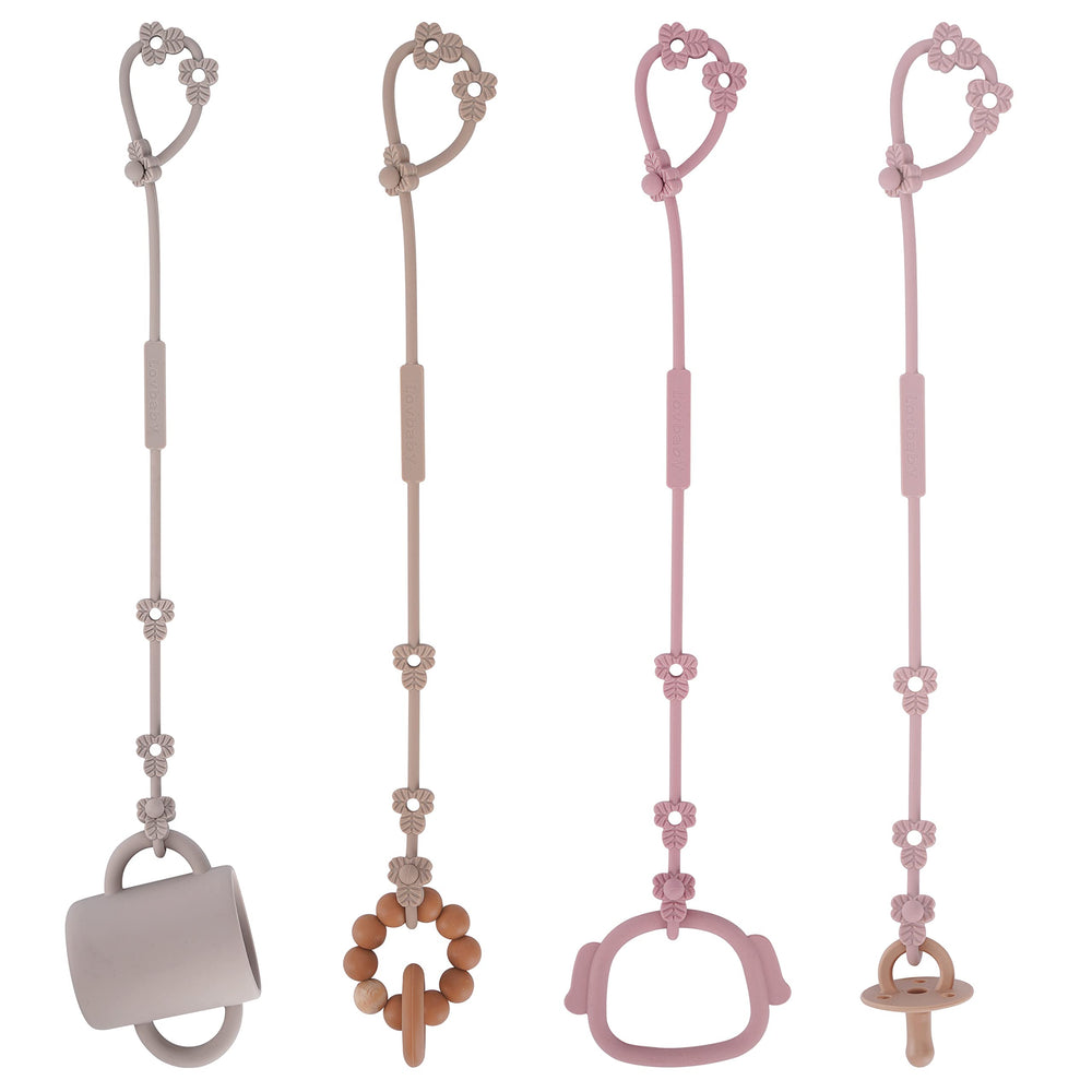 Lovbaby toy safety strap with leaf design keeps toys within reach on the stroller.