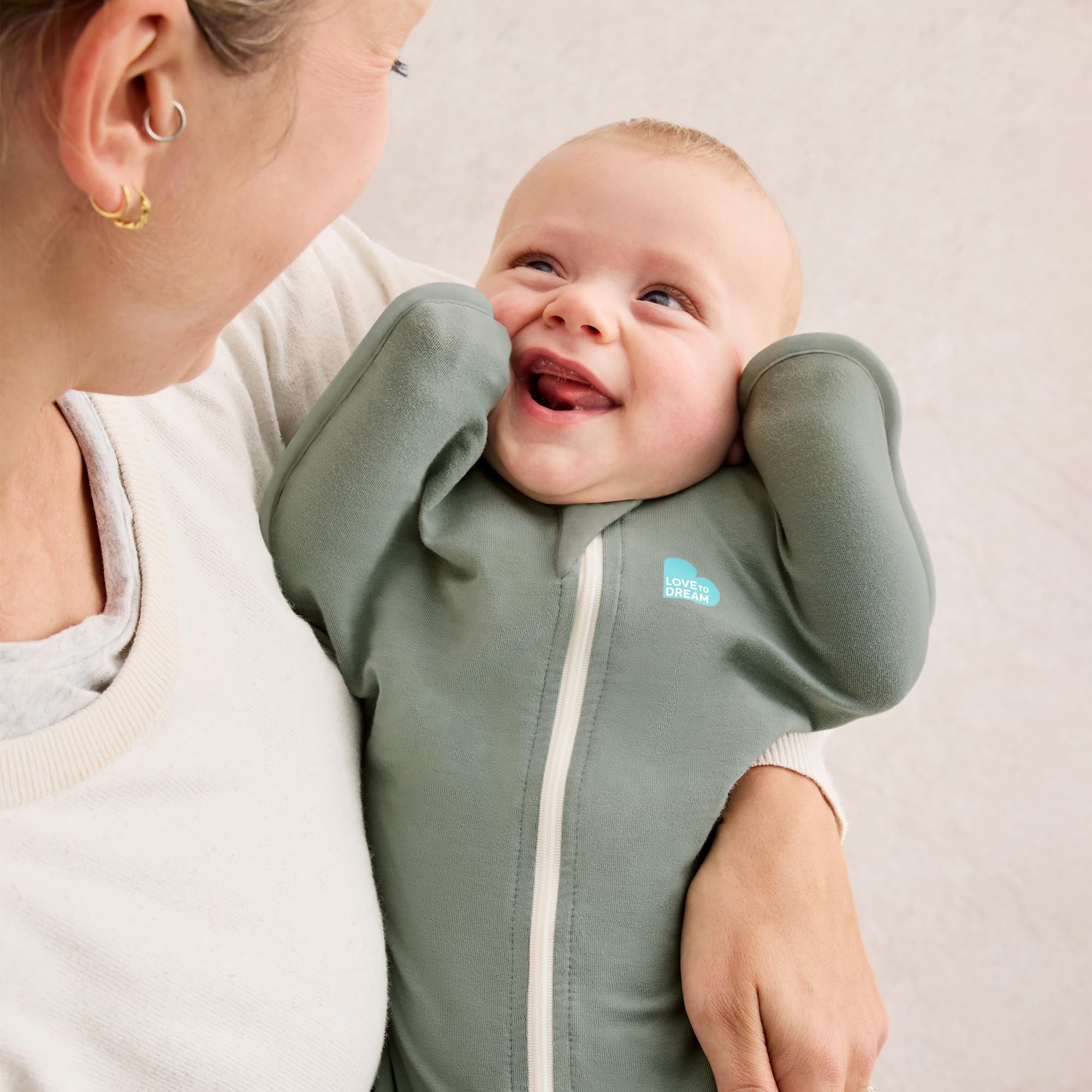 Love to Dream Swaddle UP arms-up design keeps baby comfortable through the night.