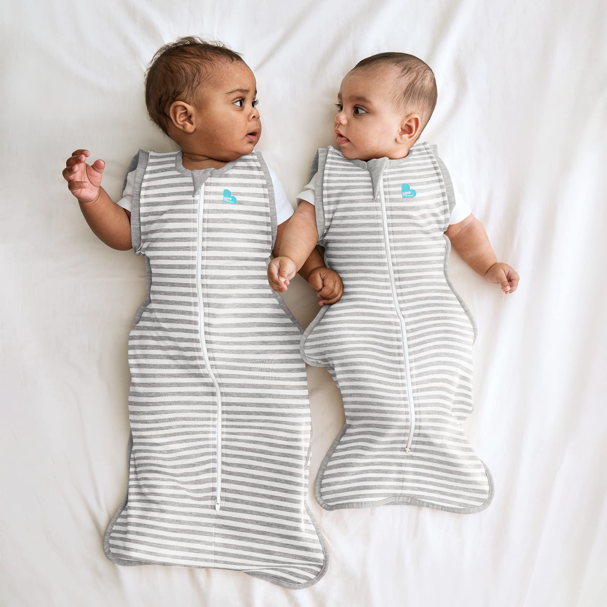 Love to Dream Swaddle Up Transition Swaddle gray fabric fosters calm bedtime ambiance.