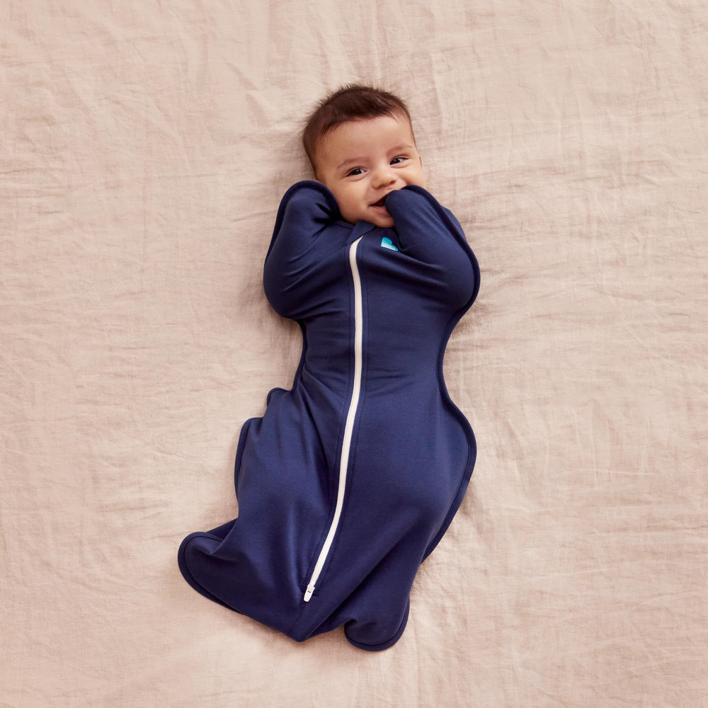 Love To Dream Swaddle Up two-way zipper enables quick diaper changes at night.