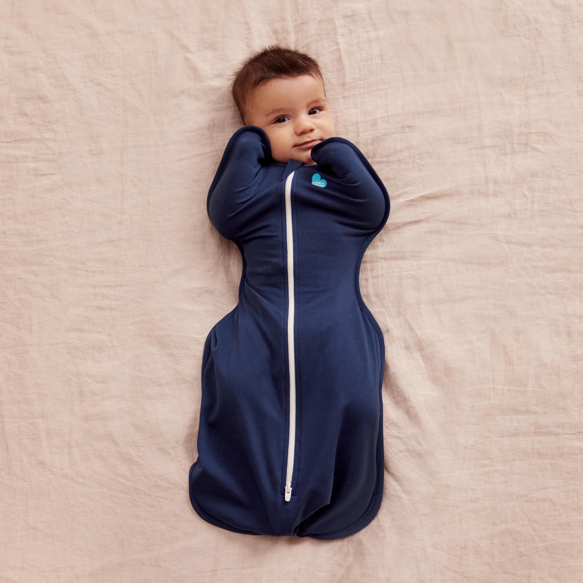 Love to Dream Swaddle Up two-way zipper enables quick diaper changes.