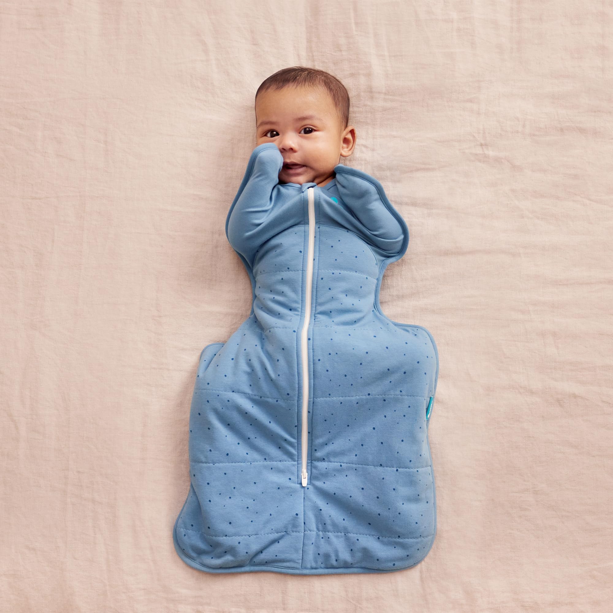 Love to Dream swaddle helps minimize startle reflex for calmer nights.