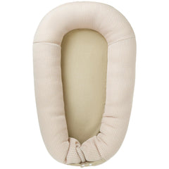 LOVE MAGE baby lounger in soft cotton for gentle comfort during supervised play.