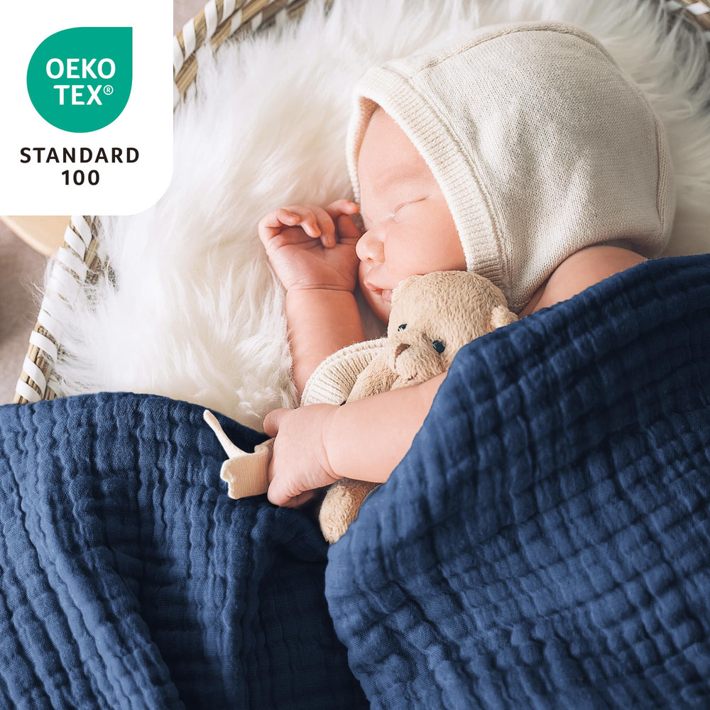Love's cabin muslin blanket cotton texture close-up, softness and durability