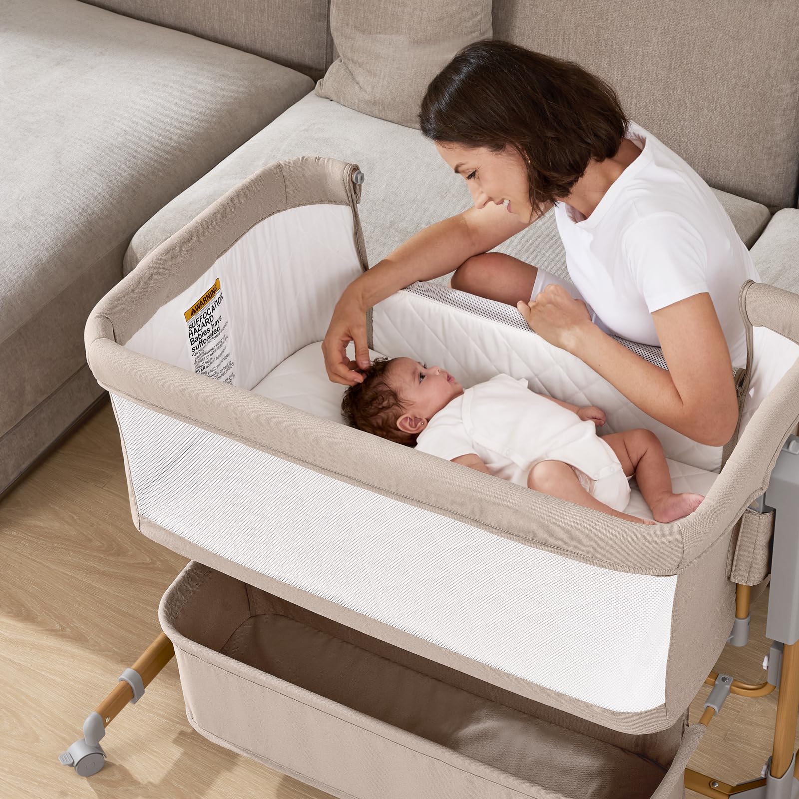LovliTod bedside sleeper includes a storage basket for essentials within reach.