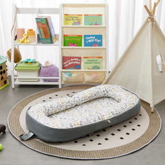 Lucakuins baby lounger highlights an awake bonding design for caregiver interaction.