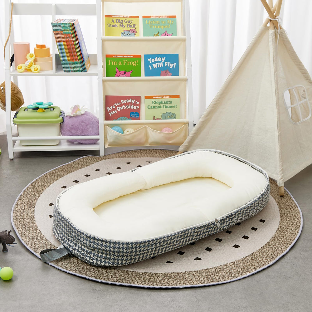 Lucakuins Baby Lounger features memory foam mat for cushioned comfort.