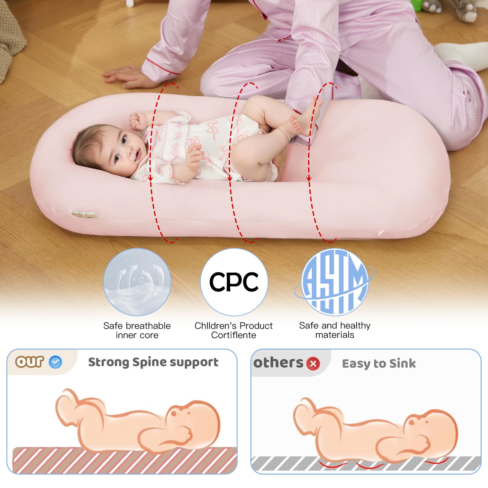 Pink Lucakuins lounger front view highlighting cozy infant space