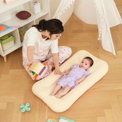 Lucakuins Baby Lounger white side view, lightweight and portable for room-to-room use