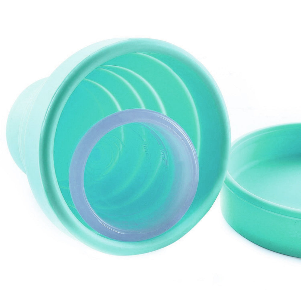 Lucky Clover collapsible cup in travel-compact form for on-the-go care.