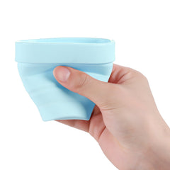 LUCKY CLOVER storing Diva Cup in travel-friendly silicone cup.