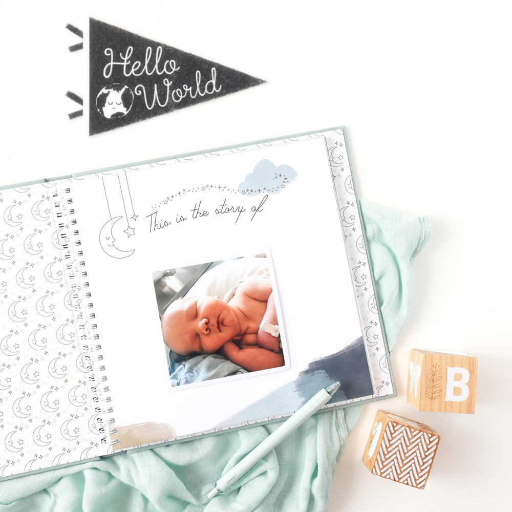 Lucy Darling Celestial Skies milestones spread helps capture first smiles and steps.