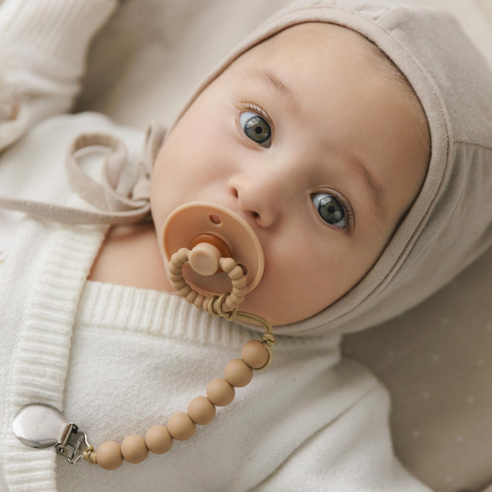 Bleu La La Luladream pacifier soft-teething handle provides gentle gum massage