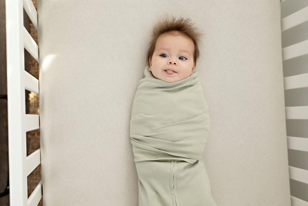LullaBaby swaddle inner wings securing baby's arms for calmer nights