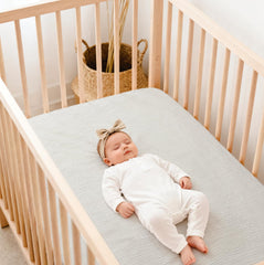 Lulu Moon crib sheets nine-inch pockets ensure snug mattress grip.
