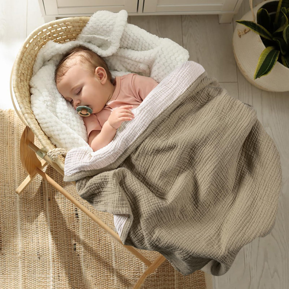 Lulu Moon Muslin Baby Blanket Olive keeps baby cozy during downtime