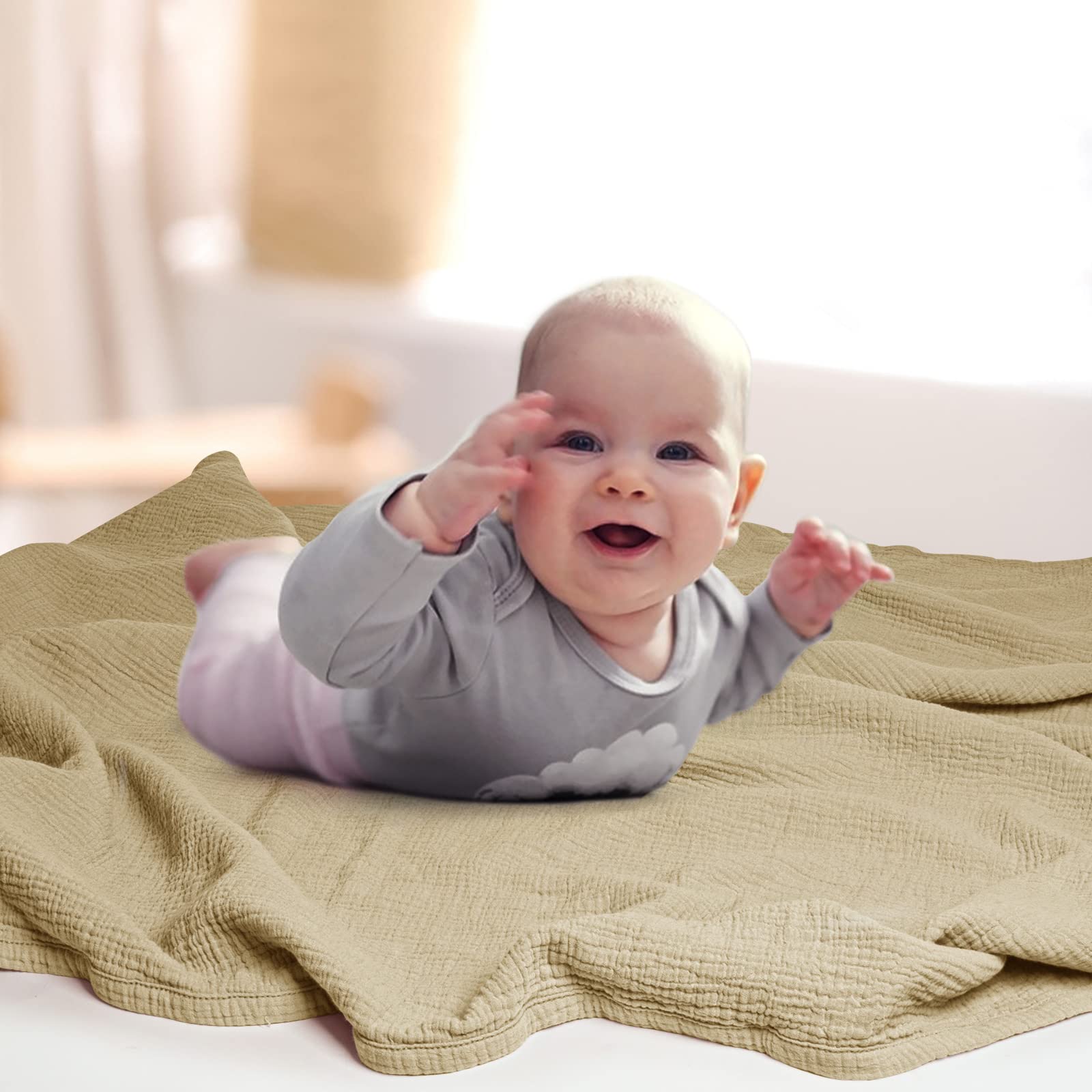 Lulu Moon muslin blanket swaddled on baby, snug warmth and softness