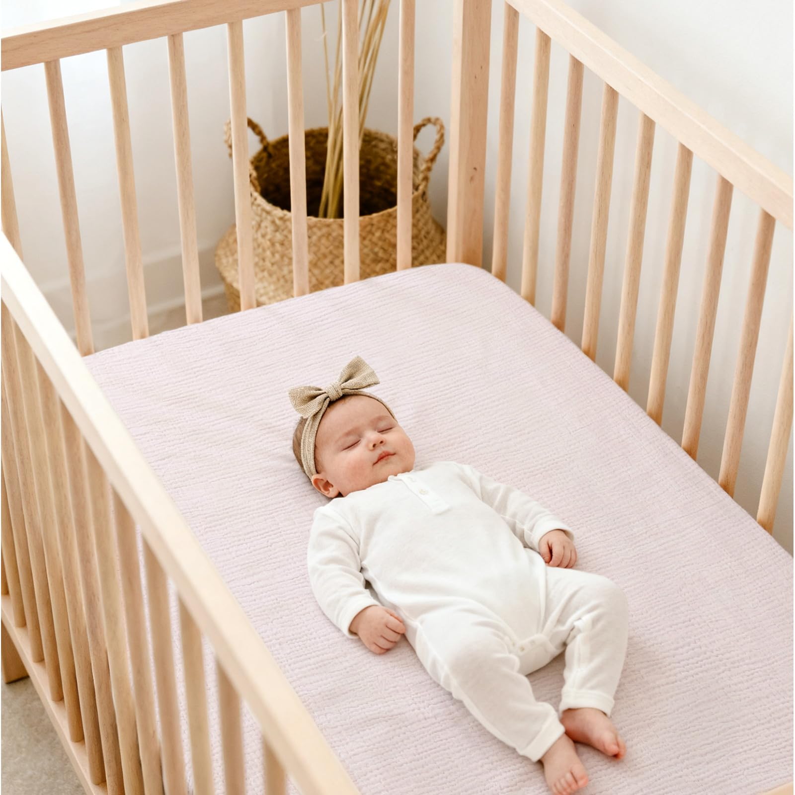 Lulu Moon Muslin Crib Sheets showing 9-inch deep pockets for mattress coverage