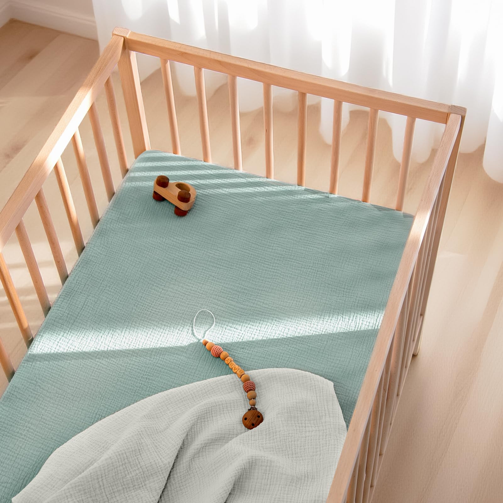 Lulu Moon muslin crib sheets standard size 28 x 52 fits most cribs.
