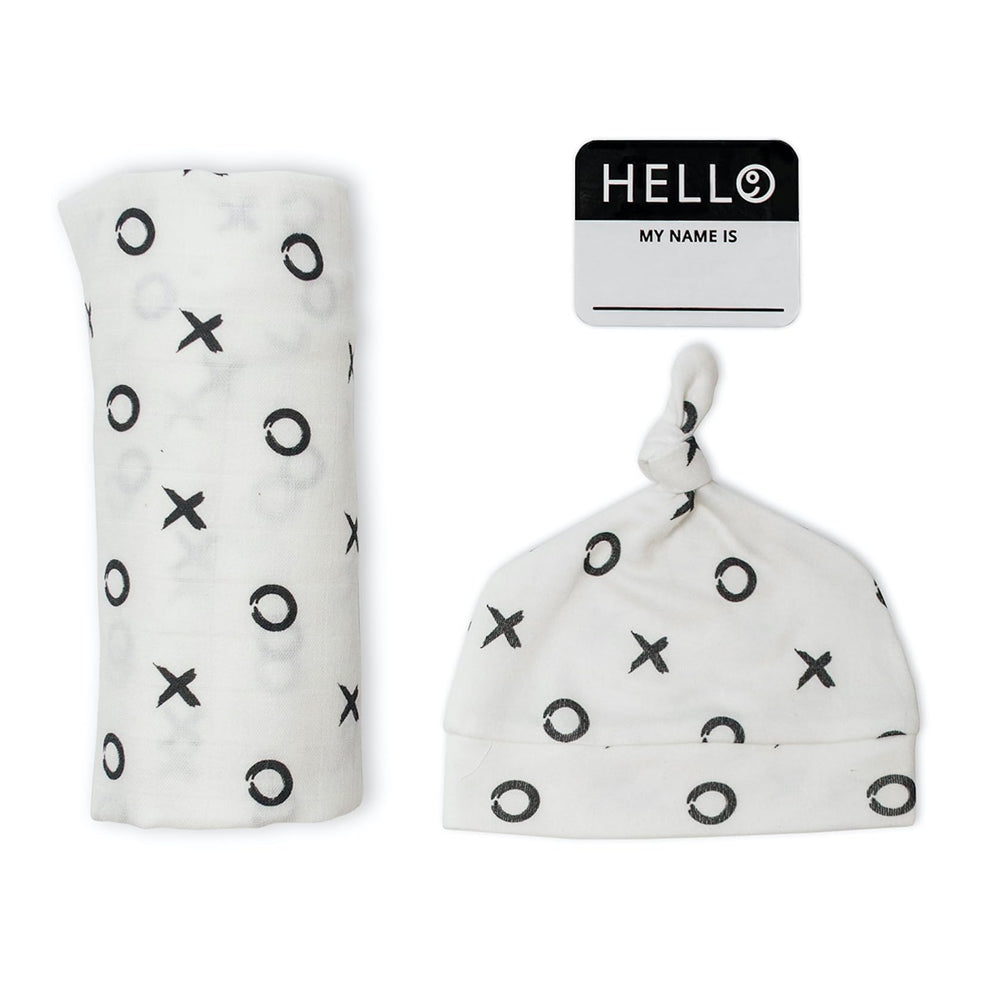 Lulujo Hello World set on newborn hat and swaddle for easy portraits