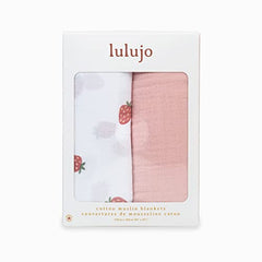 Lulujo swaddle blanket in nursery ambiance with timeless, neutral design.