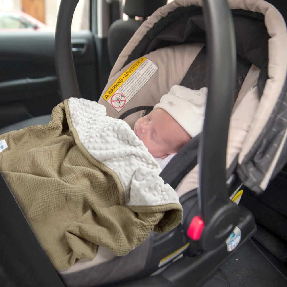 Lulumoon olive newborn-friendly blanket supports gentle skin care routines.