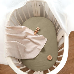 Lulumoon 30x14 sheets fit small bassinets like compact cradles.