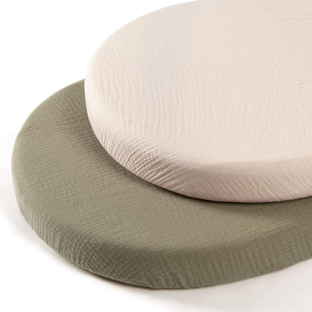 Lulumoon bassinet sheets in soft muslin cotton for gentle baby comfort.