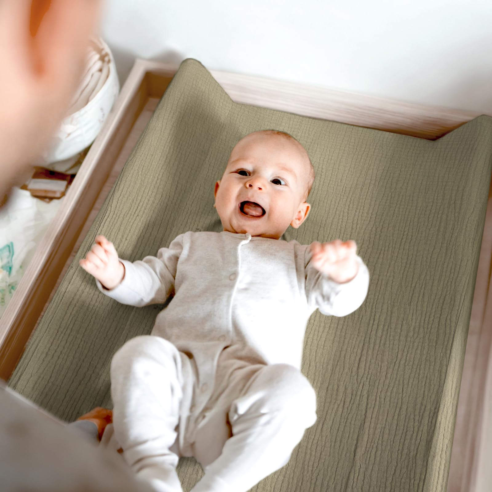 Lulumoon breathable muslin fabric helps baby stay cool during changes.