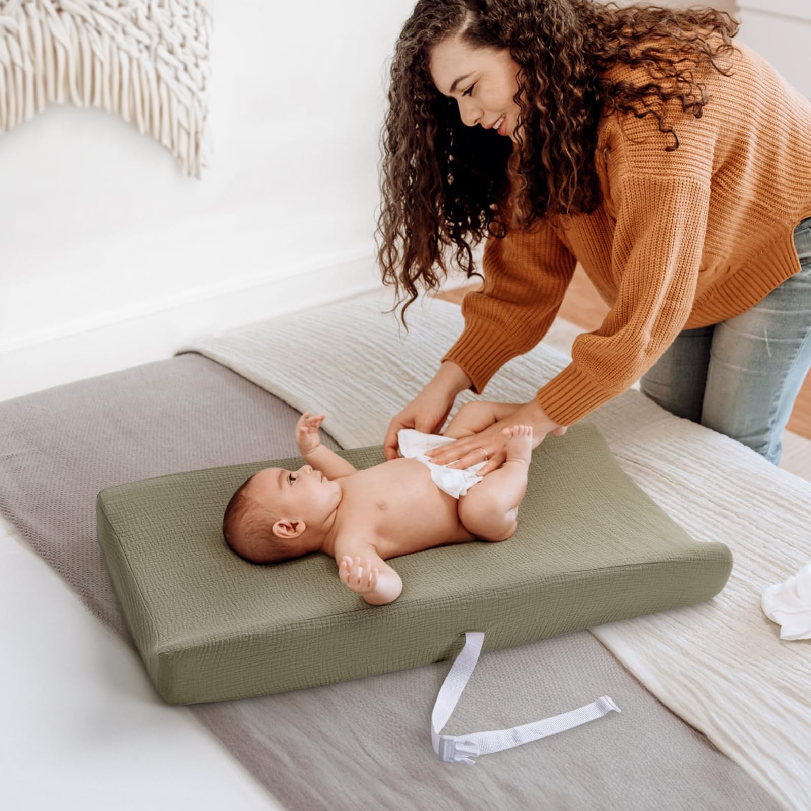 Lulumoon changing pad cover fits standard 17x33 inch pads securely.
