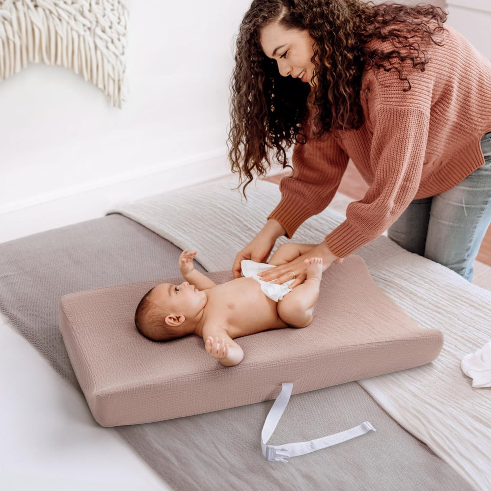 Lulumoon changing pad cover shows elastic edges for secure fit on standard pads.