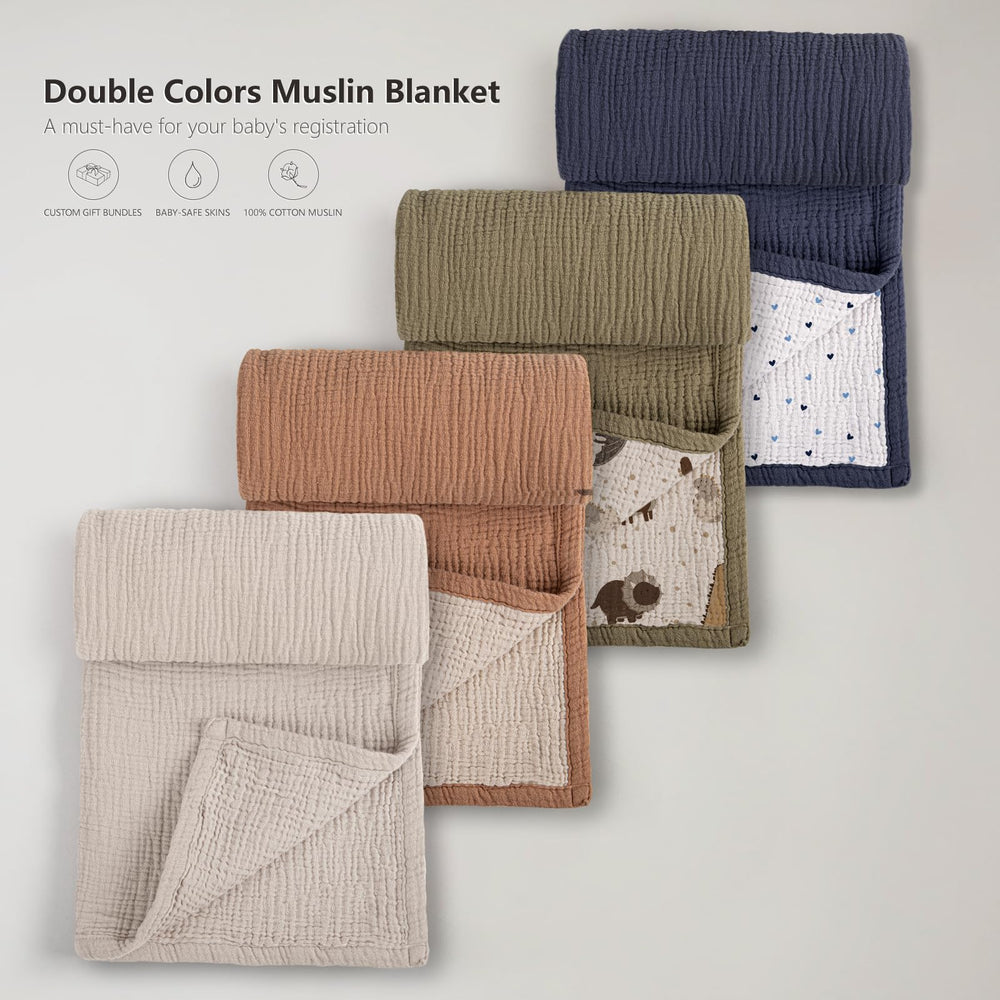 Lulumoon dinosaur muslin blanket used as crib photo backdrop for adorable pictures.