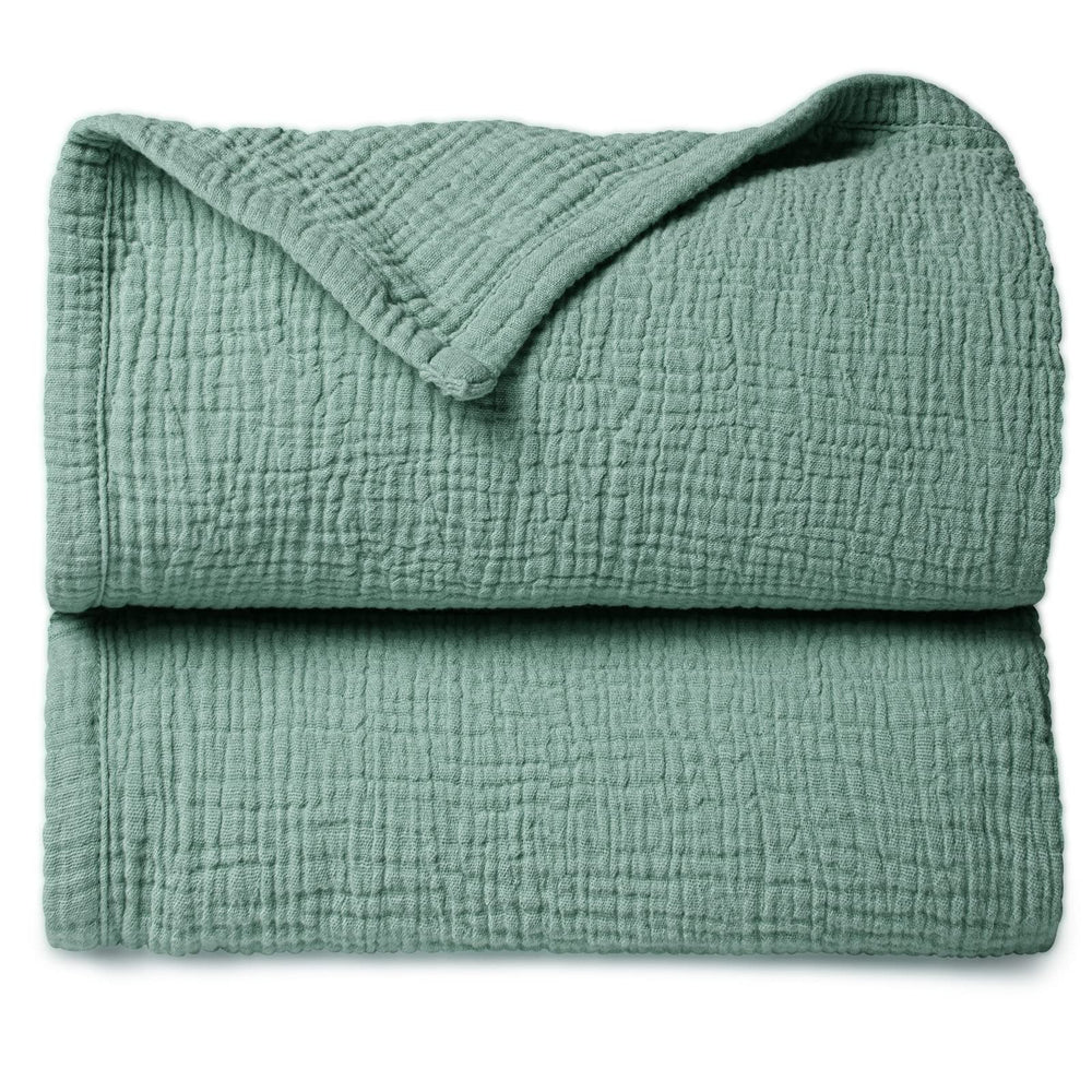 Lulumoon Lotus Leaf muslin blanket close-up showing soft cotton texture for gentle touch