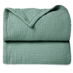 Lulumoon Lotus Leaf muslin blanket close-up showing soft cotton texture for gentle touch
