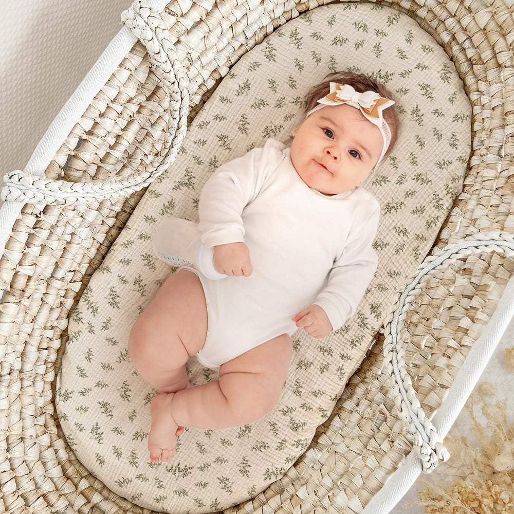 Lulumoon muslin bassinet sheets elastic edge ensures snug mattress wrap.