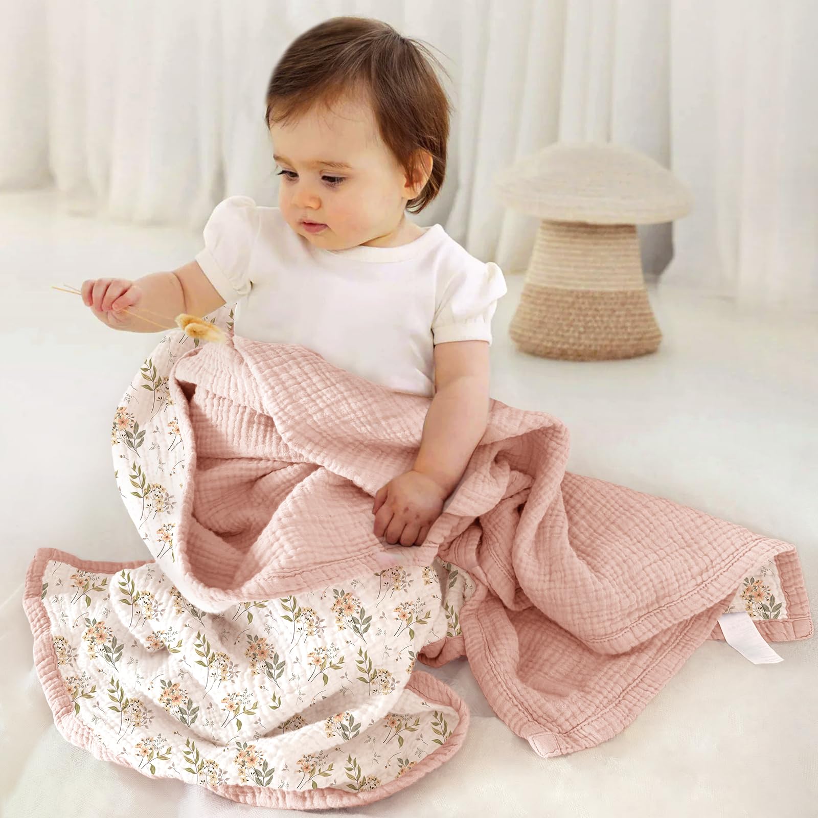 Lulumoon Muslin Blanket 47x47 folded for compact nursery storage.